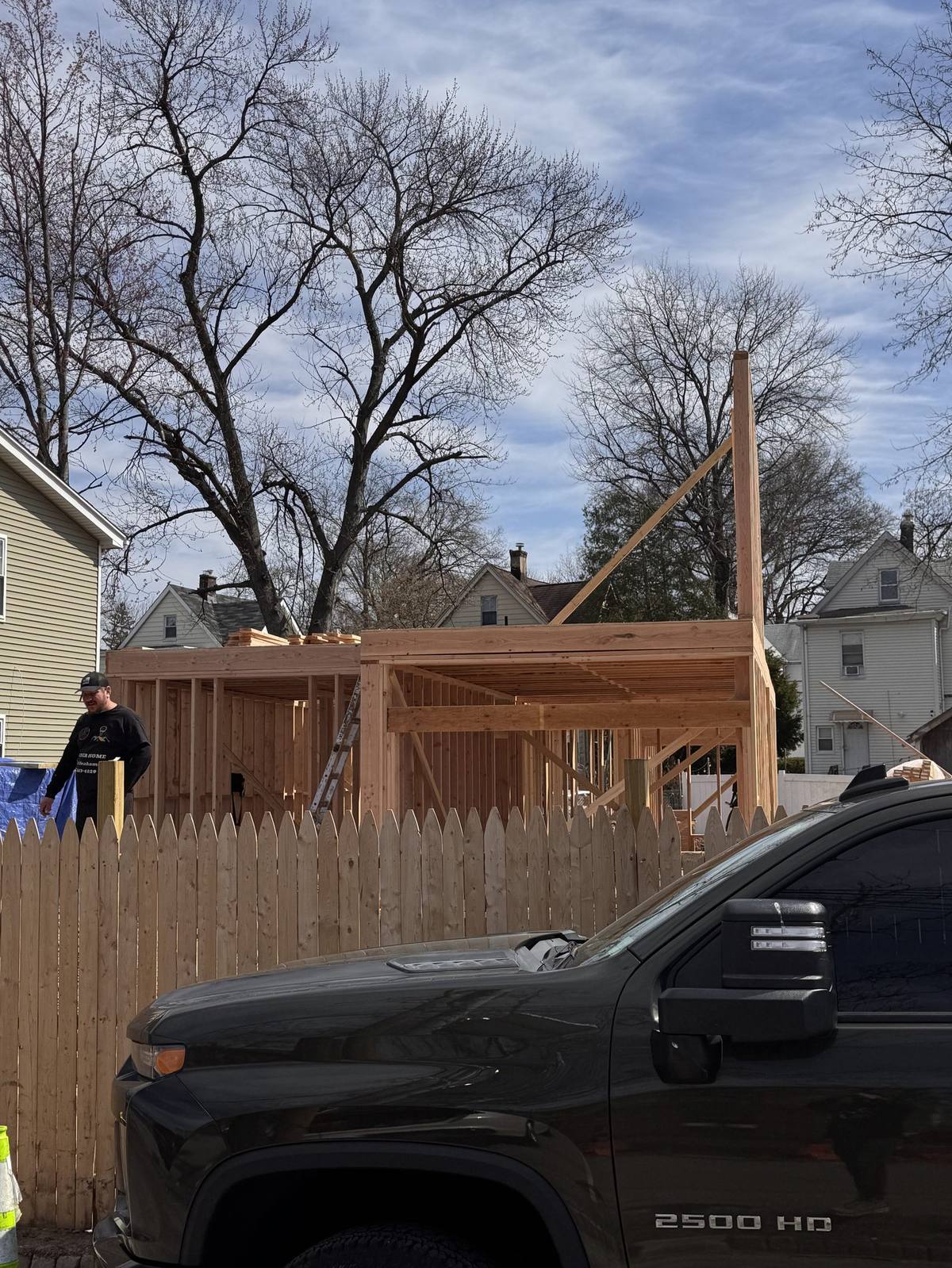 Framing crew building new home walls